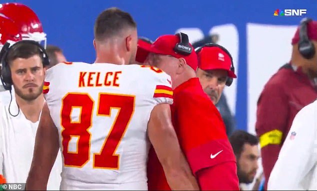 102334965-15120909-Travis_Kelce_bumps_into_his_67_year_old_head_coach_Andy_Reid_on_-a-27_17585093034.jpeg