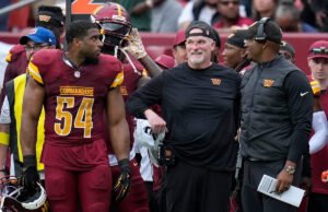 El entrenador de los comandantes, Dan Quinn, es ensangrentado después de tomar el toque de Marcus Mariota al margen