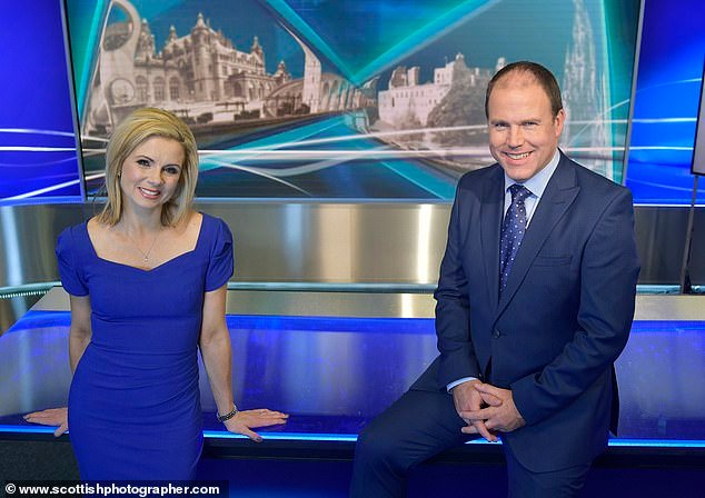 103460815-15243997-Anchorman_John_MacKay_with_fellow_newsreader_Kelly_Ann_Woodward-a-54_176185682048.jpeg