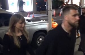Taylor Swift y Travis Kelce se dan la mano en la cena
