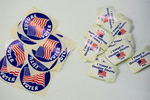 stickers-voters-kids-seen-polling-114804241.jpg