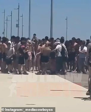 104990243-15410589-A_massive_group_of_people_were_seen_at_the_pier-a-39_1766547346947.jpg