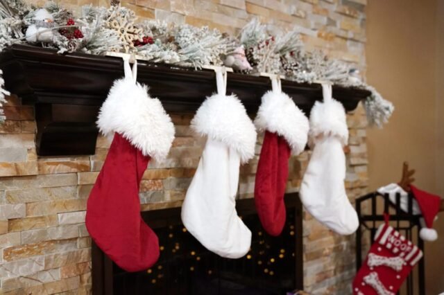 postinhouse-nypostinhouse-fireplace-stocking-74418962-e1766528050141.jpg