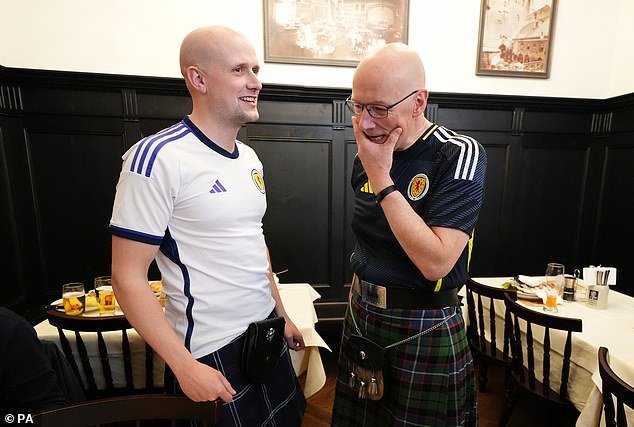 106190225-15538367-Stephen_Flynn_and_John_Swinney_in_Munich_before_Scotland_s_Euros-a-15_17704910861.jpeg
