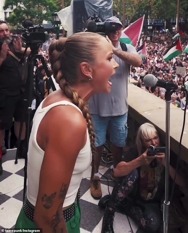 106253071-15545221-Tame_speaking_at_the_Sydney_pro_Palestine_rally_outside_Town_Hal-a-7_177071586673.jpeg