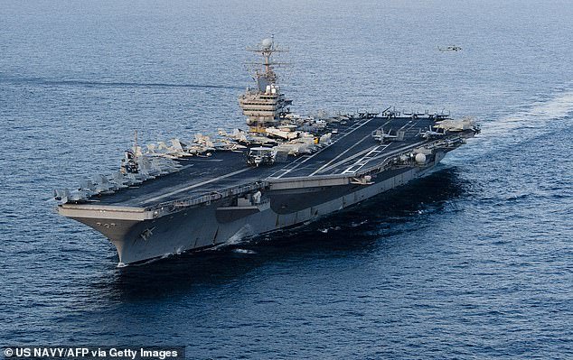 106296843-15557803-The_USS_Abraham_Lincoln_along_with_a_strike_group_is_currently_s-a-9_177099482273.jpeg