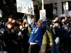 Un millón de fanáticos de los Seahawks se alinean en las calles de Seattle para el desfile del Super Bowl a pesar de la negativa de la ciudad a cerrar las escuelas