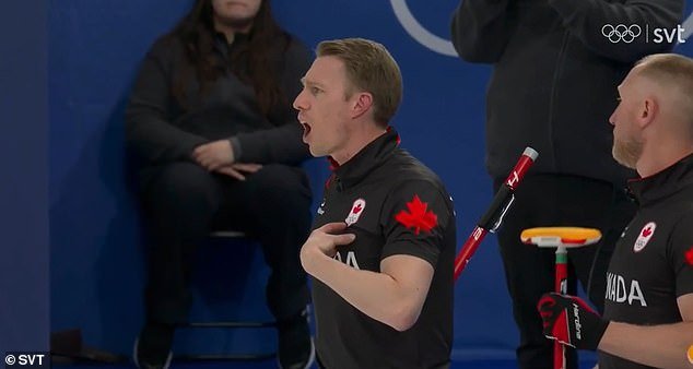 106382425-15568545-The_Winter_Olympics_curling_match_between_Canada_and_Sweden_beca-a-3_177138409061.jpeg