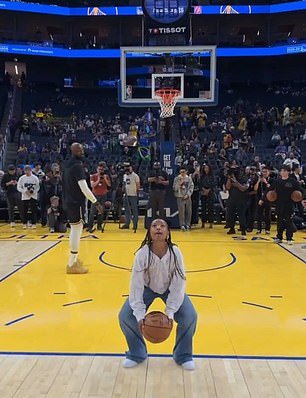 106767301-15603341-LeBron_James_daughter_Zhuri_stole_the_spotlight_at_the_Chase_Cen-a-50_17723877948.jpeg