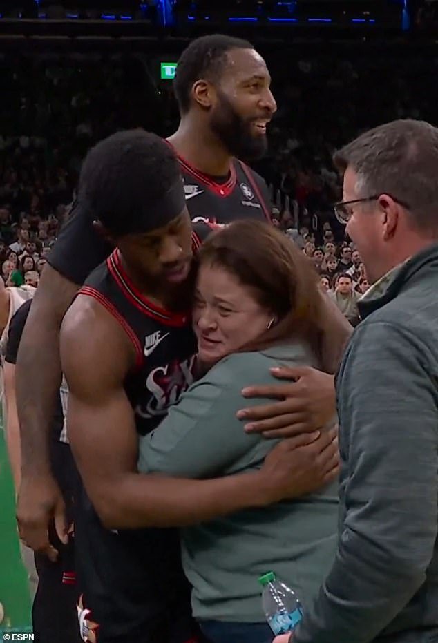 106790843-15605407-Sixers_rookie_VJ_Edgecombe_hugs_an_unidentified_Celtics_fan_afte-a-1_177246952707.jpeg