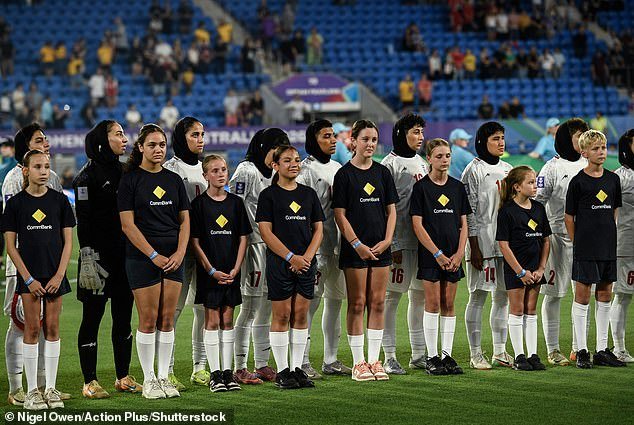 106817785-15608297-The_Iranian_football_team_pictured_have_remained_silent_during_t-a-54_17725012954.jpeg
