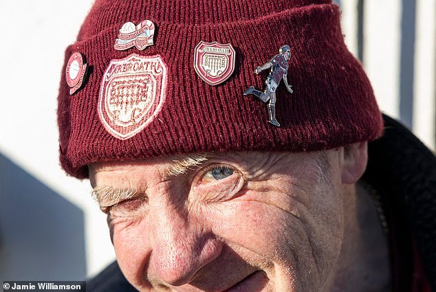 106966593-15626177-Arbroath_fan_Paddy_Evans_proudly_displays_the_club_s_crest_on_hi-a-5_177305080990.jpeg