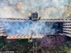 Adolescente arrestado por incendio provocado después de que un incendio devorara un edificio histórico catalogado de Grado II mientras fotografías aéreas muestran el techo y seis pisos destruidos
