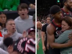 Sixers VJ Edgecombe abraza a una mujer después de una colisión en el campo