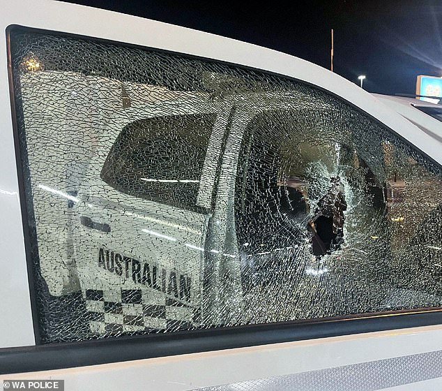 107666357-15707537-A_man_52_is_accused_of_shattering_two_windows_on_an_Australian_F-m-84_17753822312.jpeg