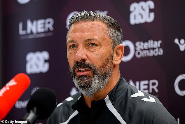 107747137-15716359-Hearts_boss_Derek_McInnes_told_the_media_that_he_s_excited_for_t-a-1_177566881263.jpeg