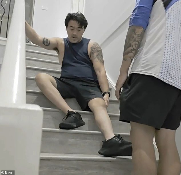 107759423-15717711-Jolly_Duong_is_monitored_as_he_tries_to_climb_up_his_stairs_desp-a-32_17757119446.jpeg