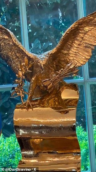 107800919-15722351-Gold_eagle_statue_in_the_Oval_Office-a-27_1775840617986.jpg