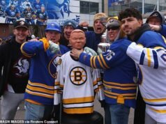 Los fanáticos de los Wild Buffalo Sabres se pelean con el modelo de los Boston Bruins mientras estallan escenas salvajes antes del primer juego de playoffs de la NHL en 15 años.