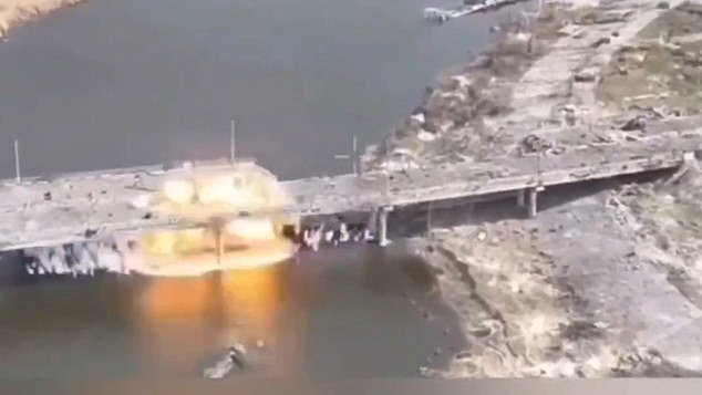 96242221-15711139-A_dramatic_video_shows_how_Ukraine_blew_up_a_bridge_used_by_Russ-a-2_1775521704269.jpeg