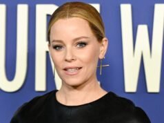 Elizabeth Banks sobre Elle Fanning en Los juegos del hambre: Amanecer sobre la cosecha