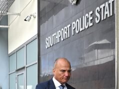 El socio de Annastacia Palaszczuk, Reza Adib, acusado de tres cargos de violación, un día después de que allanaran su lujoso apartamento.