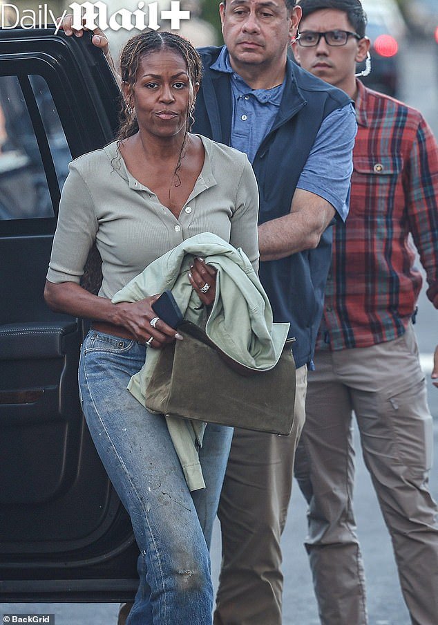 108562773-15812435-Michelle_Obama_looked_noticeable_slimmer_as_she_stepped_out_for_-a-10_17786258491.jpeg
