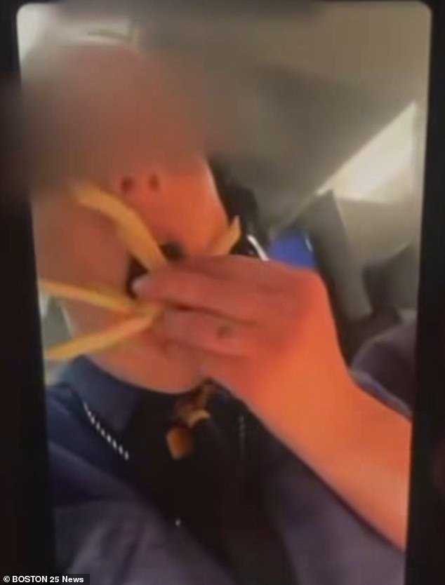 108567251-15828657-A_viral_video_shows_this_female_McDonald_s_employee_shoving_frie-a-1_177914221249.jpeg