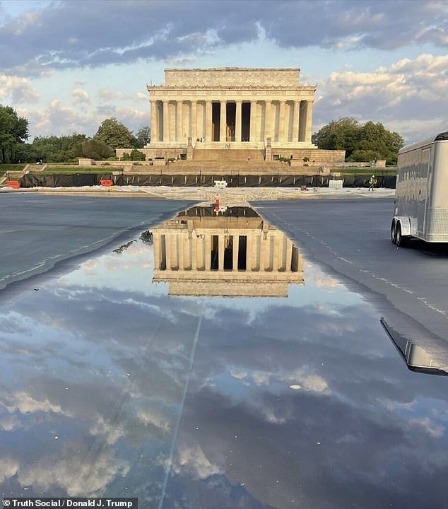 108663807-15824331-One_image_showed_the_Washington_Monument_perfectly_mirrored_in_t-a-32_17789756965.jpeg
