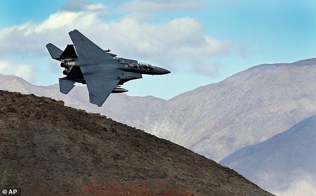108761251-15835575-An_F_15E_Strike_Eagle_turns_toward_the_Panamint_range_over_Death-a-26_17793134032.jpeg