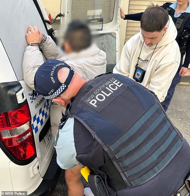 108789071-15839157-One_of_the_men_is_arrested_by_police_after_a_man_died_after_fall-a-27_17794030348.jpeg