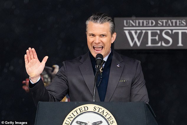 108822817-15843237-Defense_Secretary_Pete_Hegseth_broke_into_a_Donald_Trump_impress-a-23_17795570671.jpeg