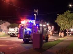Una mujer y un niño fueron apuñalados y dados por muertos en una casa en llamas, mientras un adolescente lucha por su vida en el hospital