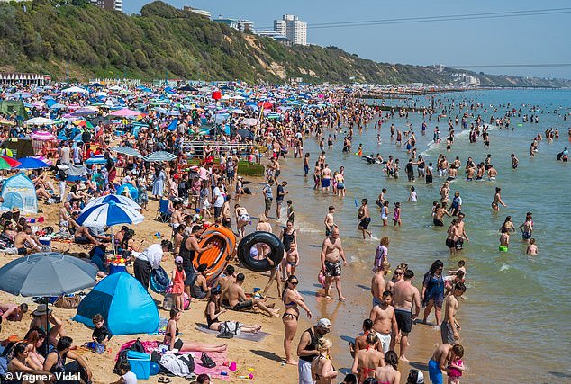 108835213-15844809-Packed_scenes_at_Bournemouth_beach_for_a_second_day_of_the_Bank_-a-2_177963805064.jpeg
