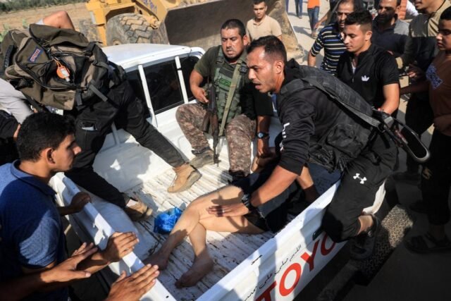 2023-palestinian-militants-begun-war-127558368_1c4746.jpg