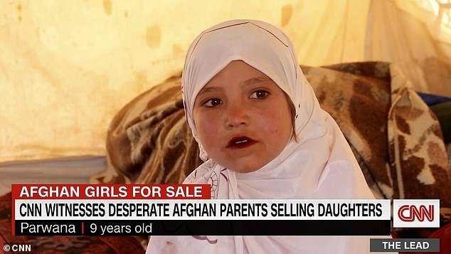 49953013-15834585-Parwana_Malik_nine_pictured_is_being_sold_by_her_parents_to_a_st-a-23_177944276469.jpeg