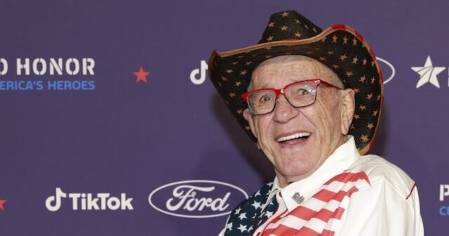 GettyImages-2245601120-Influencer-Patriotic-Kenny-Dead-at-Age-84-After-Cancer-Battle-e1779167110843.jpeg